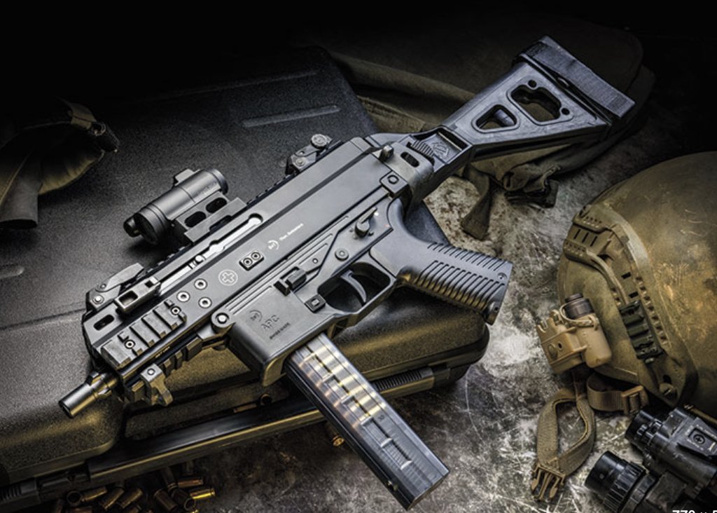 B&T APC9 Pro with tactical helmet and gear