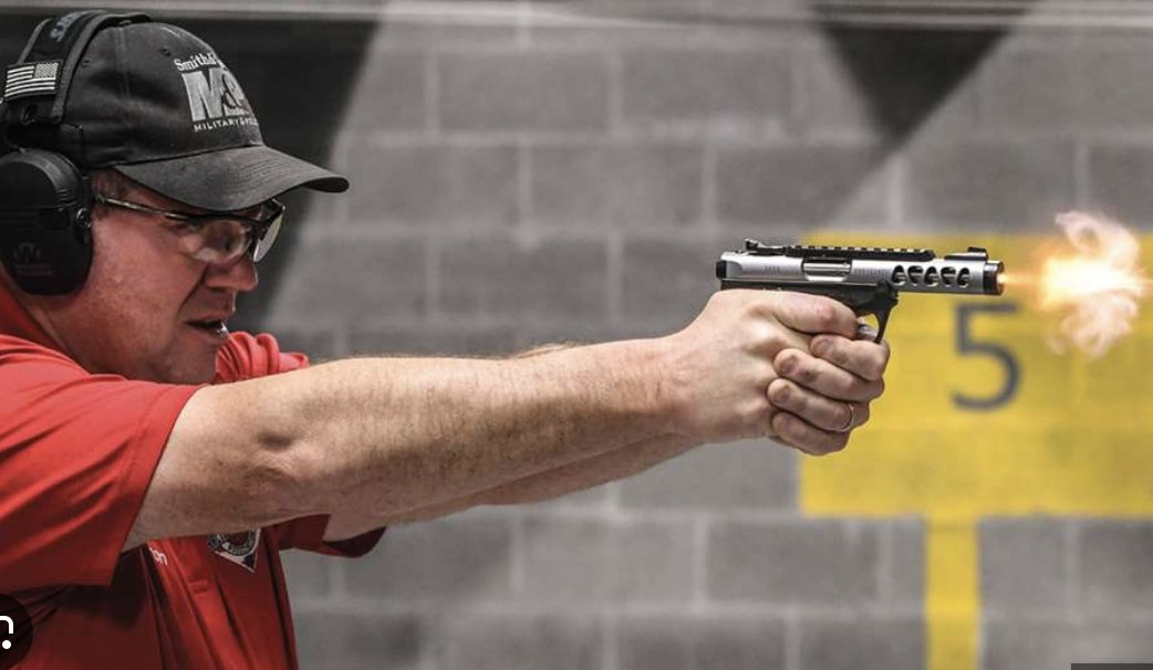 Ruger Mark IV fired at range with muzzle flash