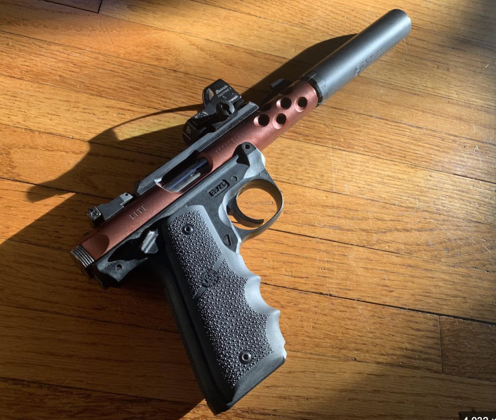 Custom Ruger Mark IV with bronze upper and suppressor